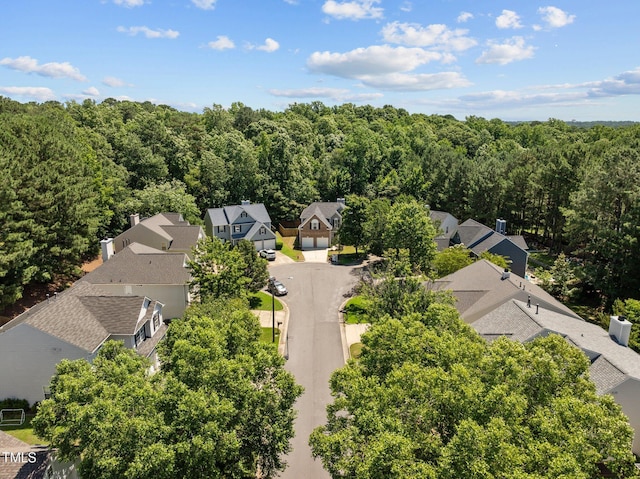 110 Bonhill Ct, Apex, NC 27502 - aerial perspective of suburban area with a heavily wooded area