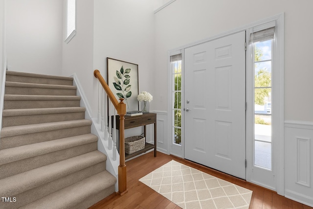 110 Bonhill Ct, Apex, NC 27502 - foyer with stairs, light wood-style floors, and plenty of natural light