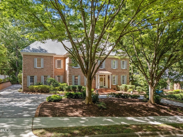 1105 Tazwell Pl, Raleigh, NC 27612 - colonial house with brick siding