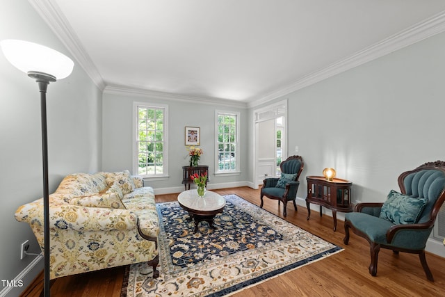 1105 Tazwell Pl, Raleigh, NC 27612 - sitting room with crown molding and wood finished floors