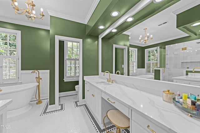 1105 Tazwell Pl, Raleigh, NC 27612 - full bathroom with a chandelier, vanity, a stall shower, a freestanding tub, and crown molding