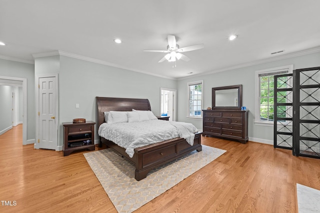 1105 Tazwell Pl, Raleigh, NC 27612 - bedroom featuring recessed lighting, light wood finished floors, ornamental molding, and a ceiling fan