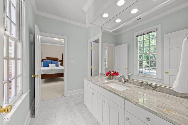 1105 Tazwell Pl, Raleigh, NC 27612 - ensuite bathroom featuring ornamental molding, vanity, marble finish floors, and recessed lighting