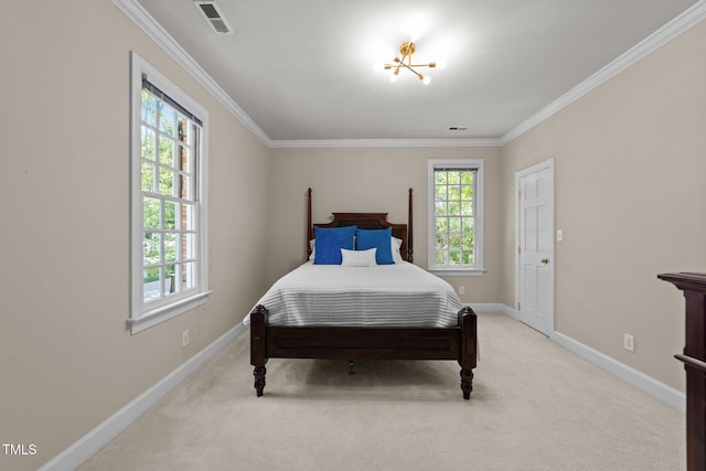 1105 Tazwell Pl, Raleigh, NC 27612 - bedroom featuring crown molding and light carpet