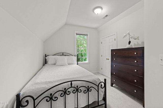 1105 Tazwell Pl, Raleigh, NC 27612 - bedroom with light colored carpet and lofted ceiling