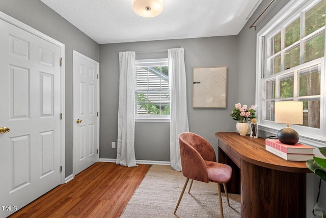 2504 State St, Durham, NC 27704 - office space featuring wood finished floors and a textured ceiling