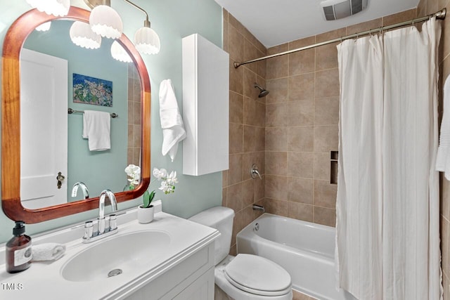 2504 State St, Durham, NC 27704 - bathroom with vanity, shower / tub combo, and a chandelier
