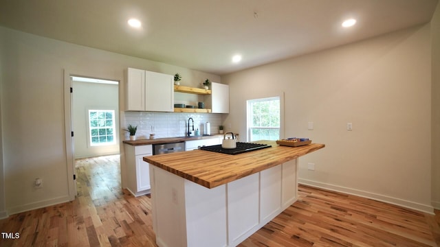 416 Everett St, Burlington, NC 27215 - kitchen with wooden counters, open shelves, white cabinetry, light wood-style flooring, and recessed lighting