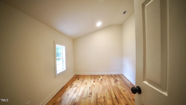 416 Everett St, Burlington, NC 27215 - unfurnished room with vaulted ceiling and light wood-style floors