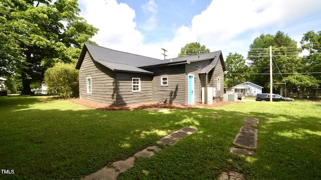 416 Everett St, Burlington, NC 27215 - back of house featuring a lawn and a metal roof