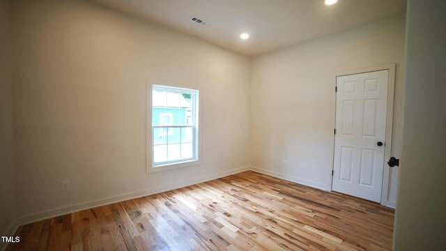 416 Everett St, Burlington, NC 27215 - unfurnished room featuring light wood finished floors and recessed lighting