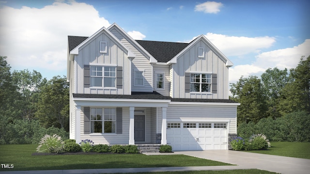 949 Cassa Clubhouse Way, Knightdale, NC 27545 - view of front of property featuring board and batten siding, driveway, a garage, and a front yard