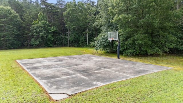 7239 Bulb Rd, Julian, NC 27283 - view of sport court featuring basketball hoop and a lawn
