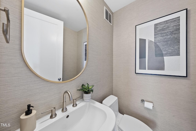 122 N Harrington St Unit 1025, Raleigh, NC 27603 - bathroom featuring a sink and toilet
