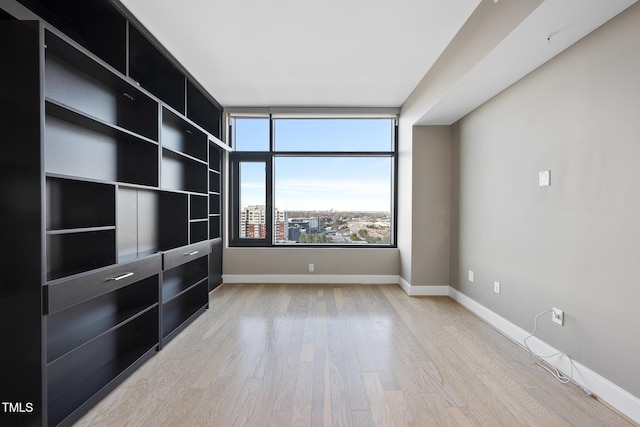 122 N Harrington St Unit 1025, Raleigh, NC 27603 - unfurnished room with light wood-style floors