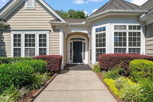 621 Aylestone Dr, Cary, NC 27519 - doorway to property with a shingled roof