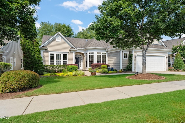 621 Aylestone Dr, Cary, NC 27519 - view of front of home featuring a front lawn, an attached garage, concrete driveway, and roof with shingles