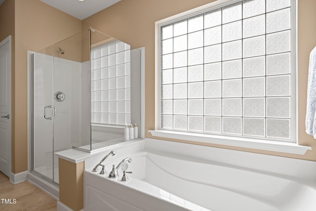 621 Aylestone Dr, Cary, NC 27519 - bathroom featuring a garden tub and a shower stall
