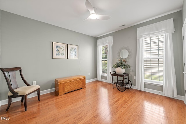 621 Aylestone Dr, Cary, NC 27519 - living area with light wood-style floors and a ceiling fan