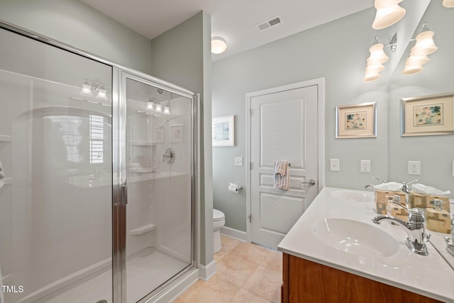 621 Aylestone Dr, Cary, NC 27519 - full bathroom featuring double vanity, a stall shower, and tile patterned floors