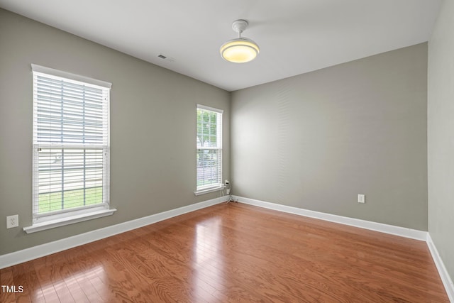 621 Aylestone Dr, Cary, NC 27519 - spare room with wood finished floors