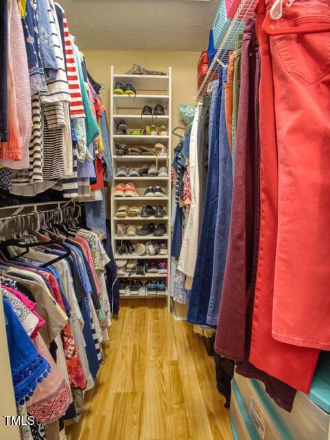 2817 Buckboard Ln, Raleigh, NC 27603 - walk in closet with wood finished floors