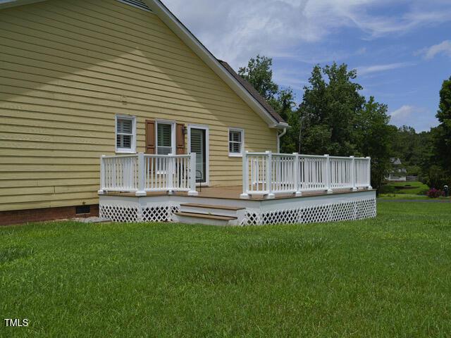 2817 Buckboard Ln, Raleigh, NC 27603 - rear view of property with a lawn, a wooden deck, and crawl space