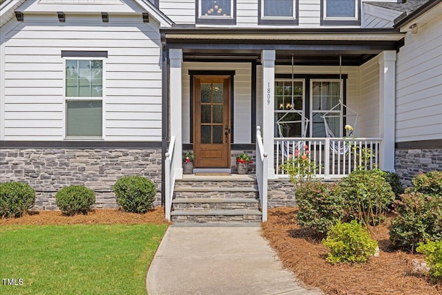 1809 Bowling Rd, Fuquay Varina, NC 27526 - entrance to property with stone siding and a porch
