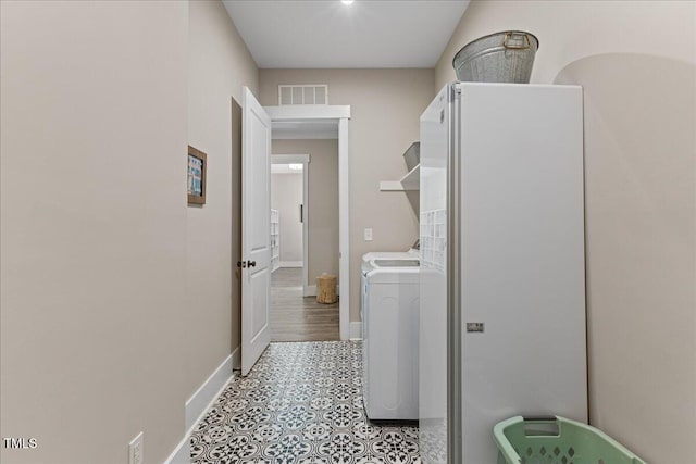 1809 Bowling Rd, Fuquay Varina, NC 27526 - laundry room with washer / clothes dryer and baseboards