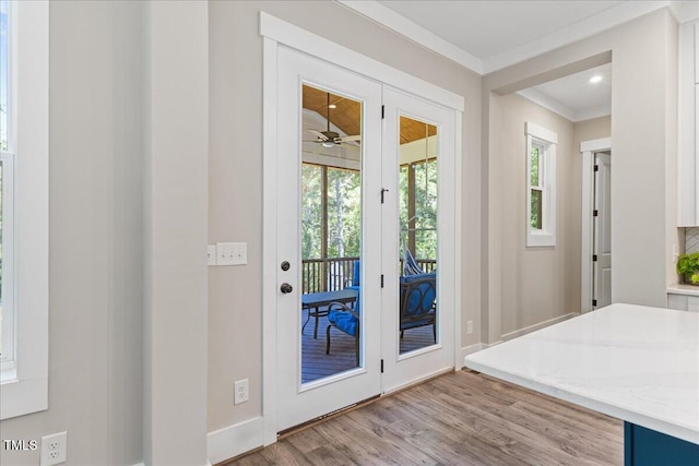 1809 Bowling Rd, Fuquay Varina, NC 27526 - doorway with plenty of natural light, light wood finished floors, ornamental molding, french doors, and a ceiling fan