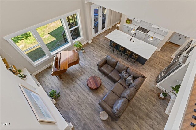 1809 Bowling Rd, Fuquay Varina, NC 27526 - living area featuring wood finished floors and baseboards