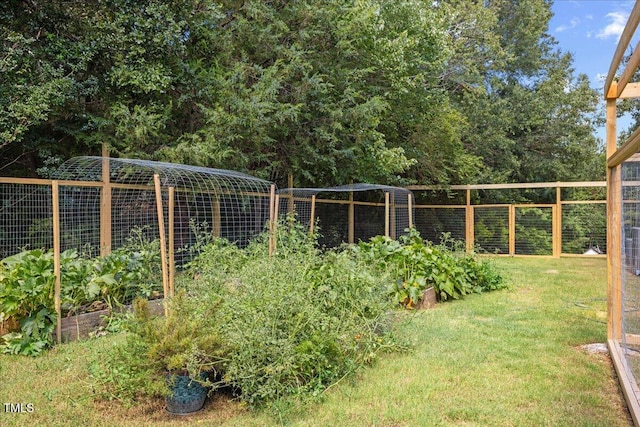 1809 Bowling Rd, Fuquay Varina, NC 27526 - view of yard featuring a garden