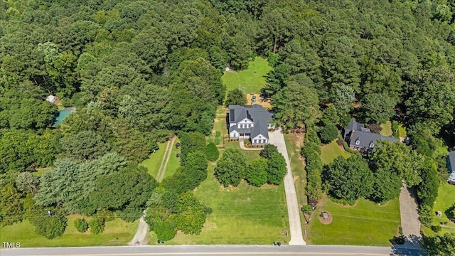 1809 Bowling Rd, Fuquay Varina, NC 27526 - aerial overview of property's location with a heavily wooded area