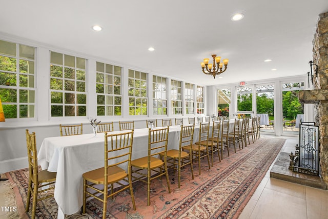 7920 E Washington St, Mebane, NC 27302 - sunroom / solarium featuring a chandelier