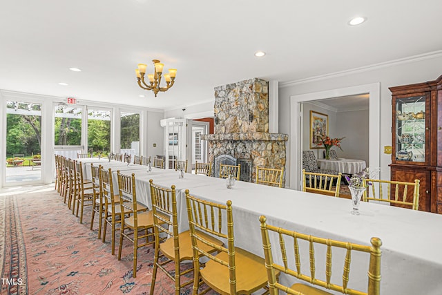 7920 E Washington St, Mebane, NC 27302 - kitchen with ornamental molding, recessed lighting, a chandelier, a stone fireplace, and carpet floors