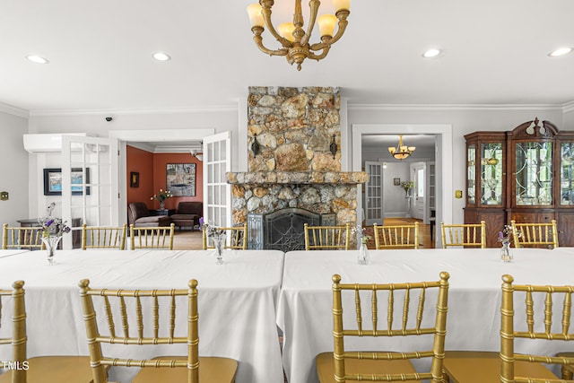 7920 E Washington St, Mebane, NC 27302 - kitchen with crown molding, a chandelier, recessed lighting, and a fireplace