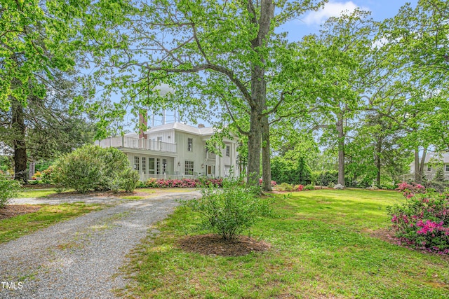 7920 E Washington St, Mebane, NC 27302 - view of green lawn featuring driveway and a balcony