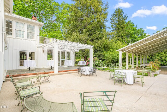 7920 E Washington St, Mebane, NC 27302 - view of patio featuring a pergola and outdoor dining area