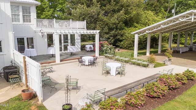 7920 E Washington St, Mebane, NC 27302 - view of patio / terrace with a wooden deck, french doors, and outdoor dining space