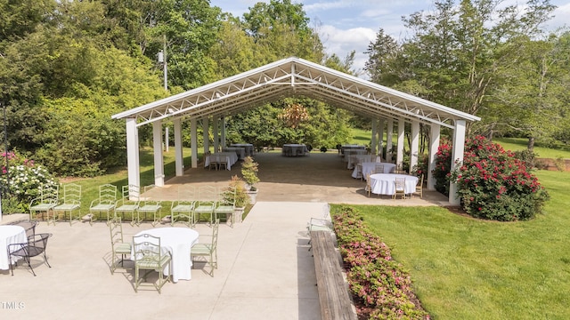 7920 E Washington St, Mebane, NC 27302 - view of community with a yard, a patio, a gazebo, and a carport