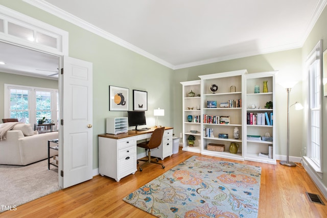 4309 Omni Pl, Raleigh, NC 27613 - office area featuring light wood finished floors and crown molding