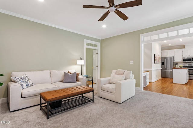 4309 Omni Pl, Raleigh, NC 27613 - living area with ceiling fan, ornamental molding, light colored carpet, and recessed lighting
