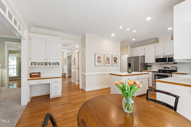 4309 Omni Pl, Raleigh, NC 27613 - dining area featuring ornamental molding, recessed lighting, and light wood-style floors