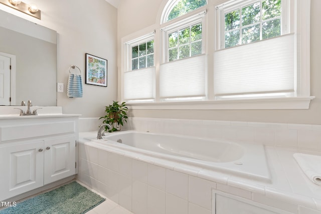 4309 Omni Pl, Raleigh, NC 27613 - full bathroom featuring vanity, a bath, and tile patterned floors