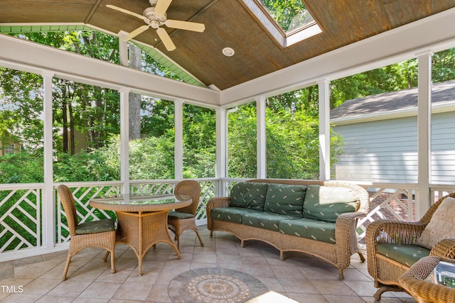 4309 Omni Pl, Raleigh, NC 27613 - sunroom featuring ceiling fan, vaulted ceiling, a skylight, and an outdoor hangout area