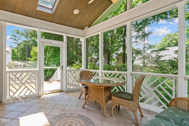 4309 Omni Pl, Raleigh, NC 27613 - sunroom with tile patterned floors, wooden ceiling, lofted ceiling, a skylight, and outdoor dining space