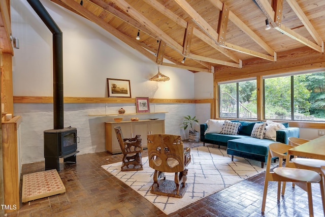 1320 Shepherd St, Durham, NC 27707 - living room featuring wooden ceiling, a wood stove, and brick patterned floors