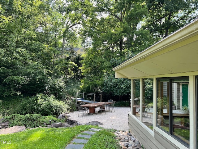 1320 Shepherd St, Durham, NC 27707 - view of yard with a patio and view of wooded area