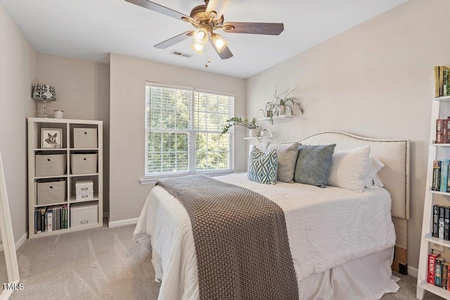 4533 Pale Moss Dr, Raleigh, NC 27606 - carpeted bedroom with baseboards and a ceiling fan