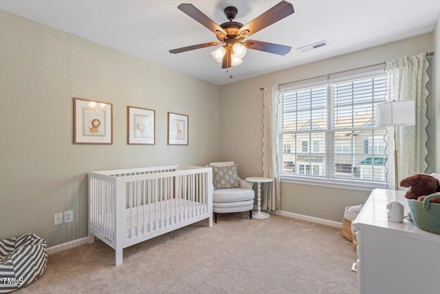 4533 Pale Moss Dr, Raleigh, NC 27606 - bedroom featuring carpet, a crib, and a ceiling fan